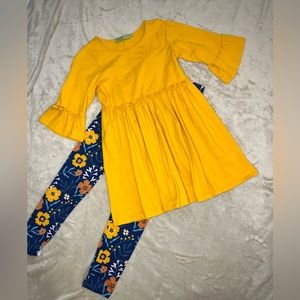 Outfit by Millie Loves Lily.  Girls size 8 ruffle dress with leggings.